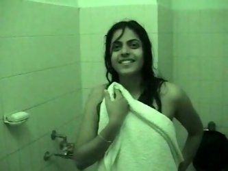 Kinky amateur Indian brunette takes a shower on cam. She shows her big ass and plays with natural tits. Then spoiled black head grabs the towel as if 