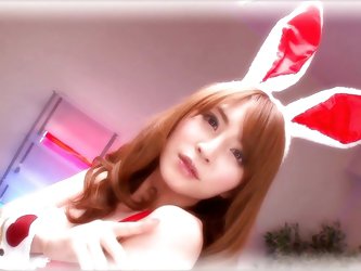This lovely looking lady is super sexy in her bunny outfit. She climbs on top of her man and kisses him sensually. Watch, as the Japanese beauty sucks