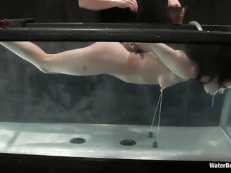 It's hard for sweet Maya to breath. Her executor got her tied up real tight and submersed her in that water tank allowing her to breath only thro