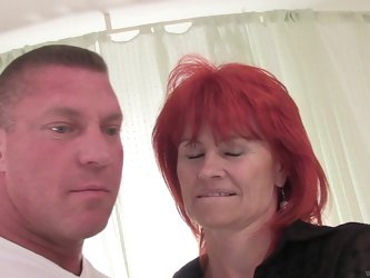 Redhead granny gets her mature pussy smashed by young stud