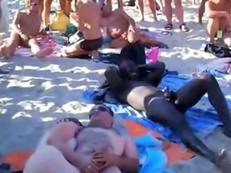 Amateur swingers recored by a voyeur on the beach of Cap d'Agde having sex. More amateur sex videos