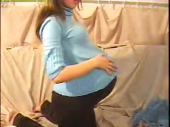 While I was pregnant I worked as a webcam slut and my shows were quite popular. In this homemade fetish video you can see me packed in various clothes
