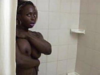 Short but very hot video of this beautiful, firm bodied strong ebony girl Dayana Chadeau showing off her muscular yet cock teasing figure under the sh