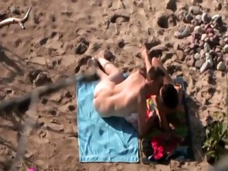 Sex on the public beach is what this couple finds exciting. They had no idea I was filming them and making this hot voyeur video. The nasty pair had t