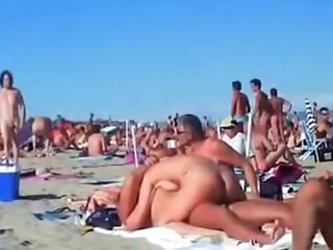 Several couples having sex on the beach of Cap d'Agde. See more beach sex videos with couples having public sex