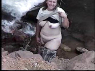 My sexy wife flashing at a mountain strem