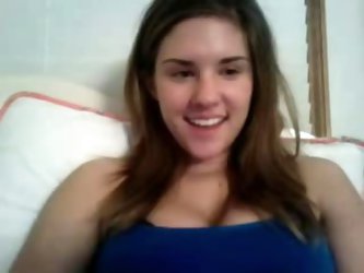Innocent, pretty brunette giving a webcam show. She takes off her blue top and thong, leaving only the sexy black bra on, with her bog round boobs loo
