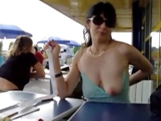 Amateur wife showing her lovely tits in a public restaurant. Its a little naughty, but this kind of things excite anyone. More