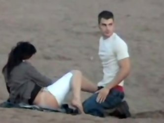 Perverted cousin of mine enjoyed to fuck his sexy and cock hungry lusty GF at the beach in daylight. He pulled down her pants and penetrated right in 