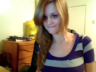 Perky teen strips on cam and starts playing with her tits, gets in for a close and and a real good tease.
