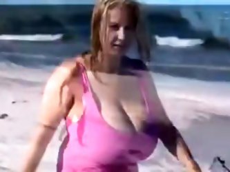 Amateur mature woman with huge boobs video. These are the biggest tits on the beach. See more mature amateur woman vidz on .