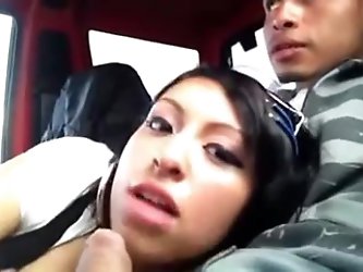 My Asian innocent amateur looking girlfriend sucks me off as I drive in my car. Her head is at my crotch licking and rubbing my big cock while filming