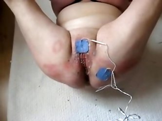 Amateur BBW woman being electro torture by husband video. One strange couple having fun with electro devices. See more homemade bondage