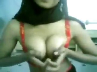 She undresses for me and lets me film her dark skin perky tits. My obedient Malaysian wife blows me in sexy orange lingerie but still wears her hijab